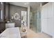 Modern bathroom with soaking tub, walk-in shower, and separate vanities at 10929 E North Ln, Scottsdale, AZ 85259