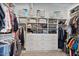 Large walk-in closet with ample shelving and hanging space at 10929 E North Ln, Scottsdale, AZ 85259