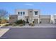 Contemporary two-story house with gray and white exterior at 10929 E North Ln, Scottsdale, AZ 85259