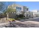 Modern home's exterior, showcasing clean lines and desert landscaping at 10929 E North Ln, Scottsdale, AZ 85259