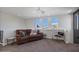 Relaxing loft with plush seating and plenty of natural light at 10929 E North Ln, Scottsdale, AZ 85259