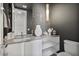 Stylish powder room with floating vanity and modern fixtures at 10929 E North Ln, Scottsdale, AZ 85259