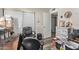 A bedroom with a desk, chair, and storage at 11840 N 49Th Ave, Glendale, AZ 85304