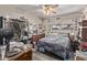 Small bedroom with a full-size bed and ceiling fan at 11840 N 49Th Ave, Glendale, AZ 85304