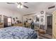 Bedroom with a full-size bed and mirrored closet doors at 11840 N 49Th Ave, Glendale, AZ 85304