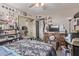 Bedroom with full-size bed, dresser, and shelving at 11840 N 49Th Ave, Glendale, AZ 85304