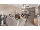 Living room with fireplace, neutral walls, and comfy seating at 11840 N 49Th Ave, Glendale, AZ 85304