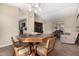 Open dining area with adjacent kitchen and living room at 1243 E Avenida Grande --, Casa Grande, AZ 85122