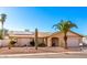One-story home with solar panels and desert landscaping at 1243 E Avenida Grande --, Casa Grande, AZ 85122
