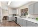 Updated kitchen with modern gray cabinets and stainless steel appliances at 1243 E Avenida Grande --, Casa Grande, AZ 85122