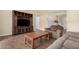 Living room featuring a media cabinet and comfy seating at 1243 E Avenida Grande --, Casa Grande, AZ 85122