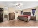 Spacious main bedroom with dresser and king-size bed at 1243 E Avenida Grande --, Casa Grande, AZ 85122