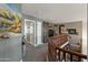 Upper hallway with barn doors and carpet flooring at 12682 W Desert Mirage Dr, Peoria, AZ 85383