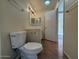 Full bathroom with toilet and double vanity at 1319 E Susan Ln, Tempe, AZ 85288