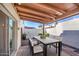 Covered patio with dining table and chairs, perfect for outdoor entertaining at 13408 N 25Th Dr, Phoenix, AZ 85029