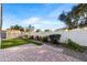 Landscaped backyard with artificial turf and garden at 1427 E Saddlebrook Ct, Casa Grande, AZ 85122