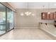 Spacious dining area with sliding glass doors to patio at 17770 W Cottonwood Ln, Goodyear, AZ 85338