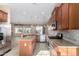Stainless steel appliances and granite countertops in kitchen at 17770 W Cottonwood Ln, Goodyear, AZ 85338
