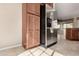 Kitchen pantry with pull-out shelves maximizing storage capacity at 17770 W Cottonwood Ln, Goodyear, AZ 85338