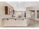 Kitchen island with granite countertops and modern cabinetry at 17770 W Cottonwood Ln, Goodyear, AZ 85338