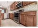 Spacious kitchen with stainless steel appliances and ample cabinetry at 17770 W Cottonwood Ln, Goodyear, AZ 85338