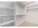Spacious walk-in closet with ample shelving and hanging space at 17770 W Cottonwood Ln, Goodyear, AZ 85338
