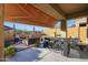 Outdoor patio with seating area, fire pit, and built-in bar at 2026 N Atwood --, Mesa, AZ 85207