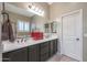 Double vanity bathroom with a large mirror and separate shower and tub at 2026 N Atwood --, Mesa, AZ 85207