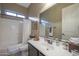 Clean bathroom with a shower/tub combo and dark vanity at 2026 N Atwood --, Mesa, AZ 85207