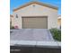 Single-story home with a two-car garage and a brick driveway at 2026 N Atwood --, Mesa, AZ 85207