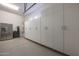 Garage with ample storage cabinets and refrigerator at 2026 N Atwood --, Mesa, AZ 85207