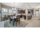 Eat-in kitchen features dark cabinetry, granite countertops, and an island at 2026 N Atwood --, Mesa, AZ 85207