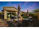 Backyard patio with fire pit and seating area at 2026 N Atwood --, Mesa, AZ 85207