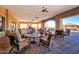 Covered patio with comfortable seating and fireplace at 2026 N Atwood --, Mesa, AZ 85207