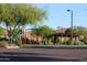 playground with play structures, slides, and shaded areas at 2026 N Atwood --, Mesa, AZ 85207