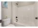 Bathroom with a bathtub and white tiled walls at 20975 E Camina Buena Vista Ct, Queen Creek, AZ 85142