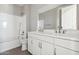 Bathroom with double vanity, tub, and toilet at 21004 N 58Th Way, Phoenix, AZ 85054