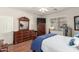 Bedroom with hardwood floors and large windows at 2101 S Yellow Wood -- # 75, Mesa, AZ 85209