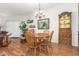 Dining room with wood table and chairs, hardwood floors at 2101 S Yellow Wood -- # 75, Mesa, AZ 85209