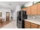 Modern kitchen with stainless steel appliances and granite countertops at 2101 S Yellow Wood -- # 75, Mesa, AZ 85209