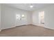 Bedroom with French doors and en-suite bath at 2123 E Encanto St, Mesa, AZ 85213