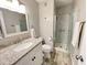 Bathroom with granite vanity and a walk-in shower at 2228 E Campbell Ave # 121, Phoenix, AZ 85016