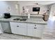 Modern kitchen with granite countertops and stainless steel appliances at 2228 E Campbell Ave # 121, Phoenix, AZ 85016