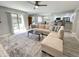 Spacious living room with sectional sofa and access to patio at 2228 E Campbell Ave # 121, Phoenix, AZ 85016