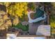 Aerial view of backyard oasis with pool, putting green, and pergola at 29991 N 78Th Pl, Scottsdale, AZ 85266