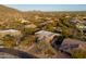 Aerial view of a house with a pool and desert landscape at 29991 N 78Th Pl, Scottsdale, AZ 85266