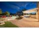 Backyard oasis with a sparkling pool, pergola, and seating area at 29991 N 78Th Pl, Scottsdale, AZ 85266
