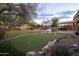 Spacious backyard with putting green and pool area at 29991 N 78Th Pl, Scottsdale, AZ 85266