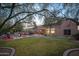 Large backyard with putting green, pool and seating area at 29991 N 78Th Pl, Scottsdale, AZ 85266