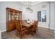 Formal dining area with wood table and large windows at 29991 N 78Th Pl, Scottsdale, AZ 85266